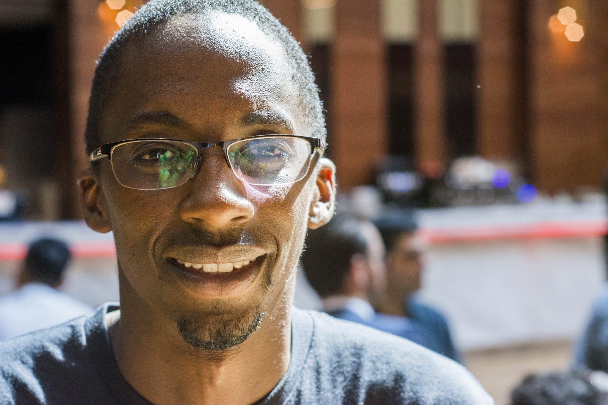 A man apart of the Gospel Workers smiling