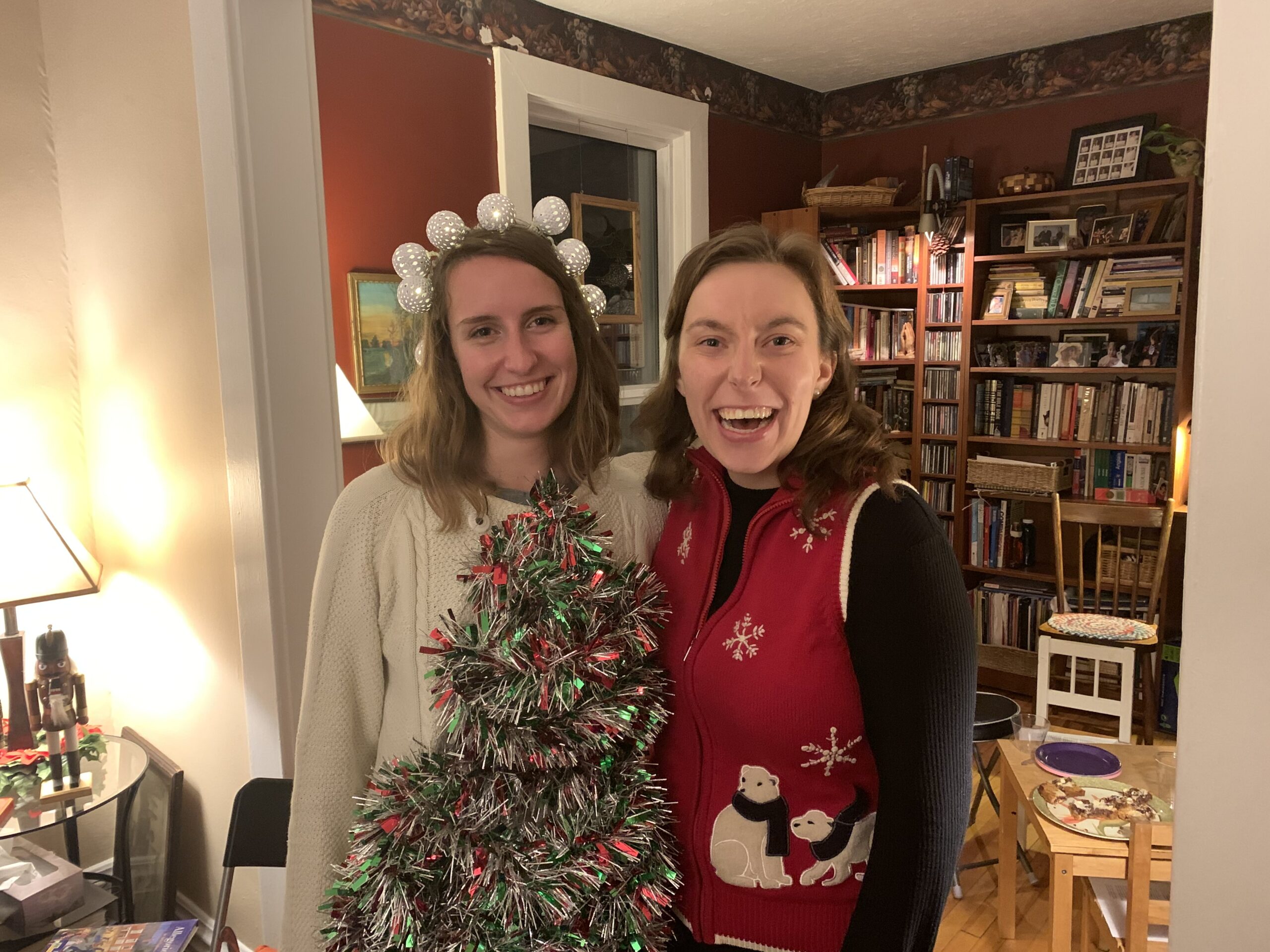 Two girls smiling in Christmas wear